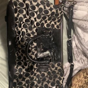 Black and gray coach purse